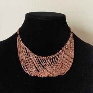 Dropped bib necklace multiple strands of fine chains copper coated